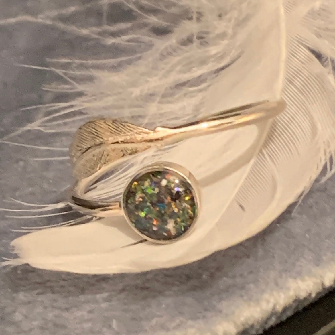 MEMORIAL ADJUSTABLE FEATHER RING